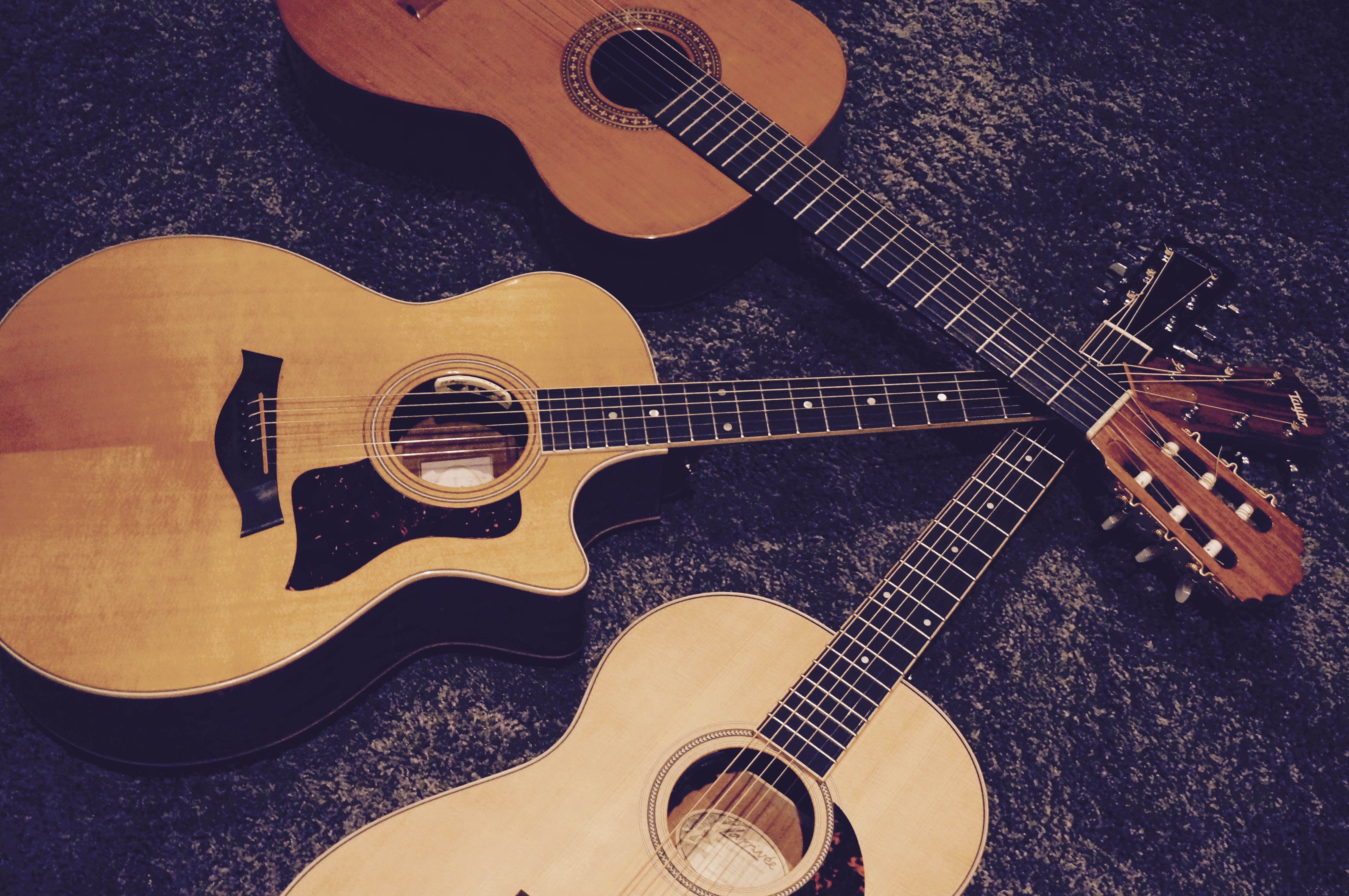 Three acoustic guitars